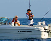 Father and son in Surf City on Topsail Boat Rental 19 Foot Dual Console Triumph Boat